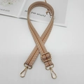 Detail of wave pattern woven shoulder strap with gold metal swivel lobster hooks - Brown With Gold Hook