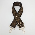 Close-up of adjustable diamond pattern woven bag strap with golden metal lobster clasps - Black and Brown With Gold Hook