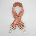Detail of adjustable orange diamond pattern nylon strap with gold alloy metal buckles - Beige and Orange With Gold Hook