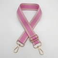 Detail of adjustable pink and beige herringbone woven bag strap with gold metal hooks - Gold Hook / Barbie Pink