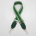 Detail of adjustable green and white chevron woven strap with gold metal hooks - Green