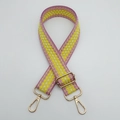 Detail of adjustable woven shoulder strap with pink and yellow plaid pattern and gold hooks - Pink Edge Pinkish Yellow + Gold Hook