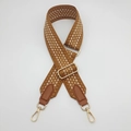 Detail of adjustable brown geometric woven strap with gold lobster clasps and PU leather - Gold Hook / Brown/Brown Leather