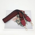 Detail of adjustable ethnic style woven strap with gold metal hooks and red leather ends - Wine Red Webbing Red Leather + Gold Hook