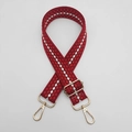 Close-up of adjustable red and white geometric woven strap with gold metal lobster clasps - Red Edge White + Gold Hook
