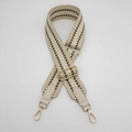 Close-up of adjustable woven bag strap with geometric dots and gold metal hardware - Gold Hook / Coffee with Beige Border/Beige White Leather