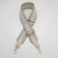 Detail of adjustable honeycomb pattern jacquard strap with gold metal swivels - Gold Hook / Beige with Apricot Border & Silver Thread/Off-White Leather