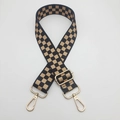 Detail of adjustable wide nylon bag strap with brown checkerboard pattern and gold clips - C4 Pattern (Gold Hook)