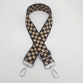 Close-up of black and yellow checkerboard nylon strap with silver metal lobster clasps - C4 Pattern (Silver Hook)