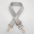 Detail of adjustable chevron strap with golden swivel hooks for crossbody handbags - Light Gray Apricot White + Gold Hook (Silver Thread)