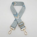 Close-up of thick adjustable strap with geometric wave pattern and gold metal hooks - Light Blue Gray Apricot White + Gold Hook