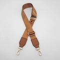 Close-up of adjustable brown nylon strap with gold metal lobster clasps and D-ring - Brown