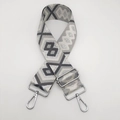 Detail of gray geometric nylon bag strap with silver metal lobster clasps and buckle - Dark and Light Gray with Silver Thread and Silver Hook