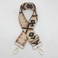 Detail showing vintage ethnic geometric weaving and gold metal swivel snap hooks - Black and Brown with Silver Thread and Gold Hook
