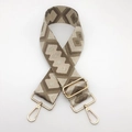 Detail showing ethnic geometric jacquard strap with golden rotating metal hooks - Light Coffee Brown with Silver Thread and Gold Hook