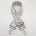 Detail of blue and beige ethnic patterned nylon bag strap with silver metal hardware - Light Blue and Khaki with Silver Thread and Silver Hook