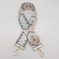 Detail of ethnic wide nylon strap with geometric patterns and gold lobster clasps - Pink and Dark Gray with Silver Thread and Gold Hook