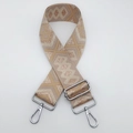 Close-up of bohemian wide adjustable nylon shoulder strap with gold geometric patterns - Dusty Pink and Khaki with Gold Thread and Silver Hook