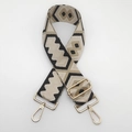 Detail of adjustable geometric diamond pattern canvas bag strap with gold metal hooks - Black Apricot and Gold Hook