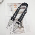 Detail of adjustable black shoulder strap with silver arrow pattern and metal swivel hooks - Black Silver Arrow Style