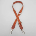 Adjustable orange geometric weave bag strap with silver metal hooks and leather trim - Orange + Orange Leather