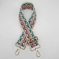 Detail of bohemian woven 5cm bag strap with geometric diamond patterns and gold hooks - Light Purple Green Geometric