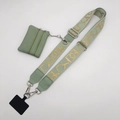 Detail view of adjustable crossbody phone strap with LUCKY text and mini coin purse pouch - Matcha Green LUCKY Print (Silver Hook Set)