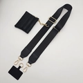 Detailed view of black nylon wide strap with a golden hook and a small leather coin purse - Black (No Bag)