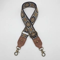Detail of bohemian jacquard bag strap with blue and yellow patterns and bronze metal hooks - Style 1 Caramel Leather