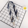 Adjustable canvas bag strap with navy geometric weave and golden metal lobster clasps - Dark Blue