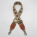 Close-up of vintage ethnic floral jacquard bag strap with bronze hooks and leather ends - Style 7 Brown Leather