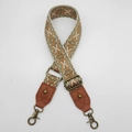 Close-up of vintage geometric pattern bag strap with bronze metal swivel hooks and leather ends - Style 8 Brown Leather