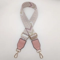 Detail of adjustable woven canvas strap with pink V-pattern and gold lobster clasps - Light Pink + Pink Leather