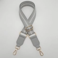 Tracolla regolabile tessuta con motivi geometrici grigi e moschettoni dorati - Grigio + Pelle Grigia