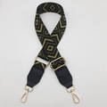 Detail of adjustable wide canvas shoulder strap with green diamond jacquard and gold clips - Black Base Army Green + Black Leather