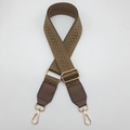 Close-up of brown chevron woven bag strap with leather ends and golden metal snap hooks - Dark Khaki