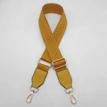Detail of ginger yellow herringbone woven strap with gold metal buckles and leather ends - Yellow + Yellow Leather