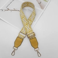 Detail of ethnic jacquard purse strap with gold metal lobster clasp and yellow PU leather trim - Beige Yellow White + Yellow Leather