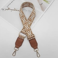 Ethnic style jacquard purse strap with brown leather and gold hardware on white background - Beige Brown White + Brown Leather