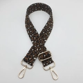 Close-up of leopard print bag strap with adjustable gold buckle and metal swivel hooks - Dark Brown White + Gold Hook