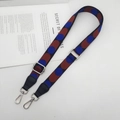 Close-up of retro red and blue dotted woven bag strap with silver metal lobster clasps - Black Blue Red (Black Leather Silver Hook)