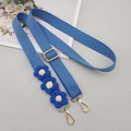 Detail of blue woven shoulder strap with handmade crochet daisy flowers and gold metal clips - Lake Blue With Patch