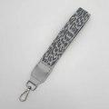 Adjustable crossbody strap with grey leopard weave pattern and silver metal clasp - Silver Thread Leopard (Handheld)
