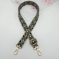 Detail of adjustable geometric diamond pattern shoulder strap with gold metal buckles - Light Green Khaki Black White
