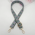 Detail of a 2.5cm geometric diamond woven strap with golden metal lobster clasps - Purple Light Blue