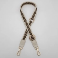 Detail eines verstellbaren schwarz-goldenen Taschengurt mit beige Leder und Goldhaken - Gold S-Haken Verbinder Verschluss / Creme Kante Schwarz Khaki + Cremeweißes Leder