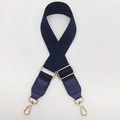 Close-up of dark blue woven bag strap with golden hardware and jacquard pattern - Vintage Blue with Blue Patch