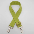 Detail of avocado green woven bag strap with diamond jacquard texture and gold hardware - Fluorescent Green