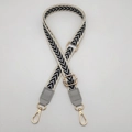 Adjustable black and white chevron pattern woven strap with grey leather ends and gold buckles - Cream Edge Grey Black + Grey Leather