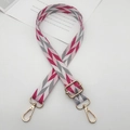 Detail of pink and grey geometric woven shoulder strap with gold metal lobster clasps - Gold Hook / Pink White Gray Magenta